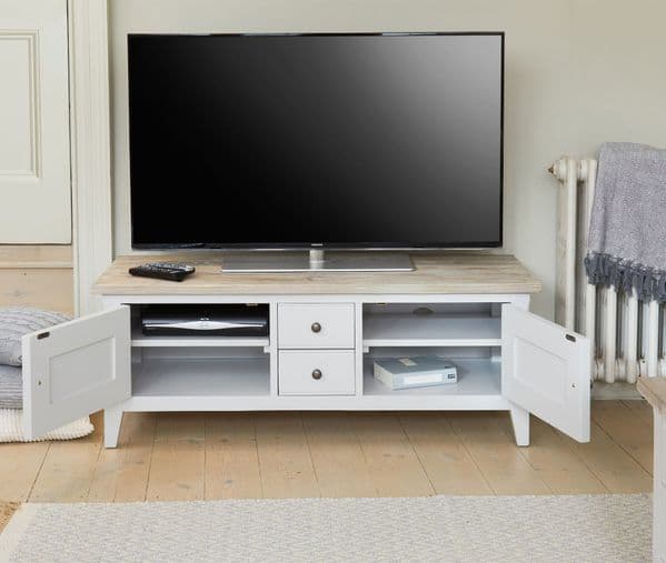 Signature Widescreen Television SandTV unit with two doors and drawers.